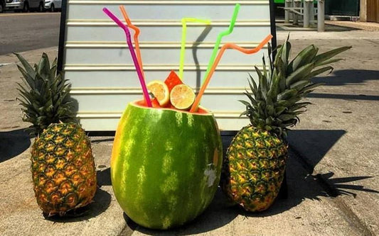 Sip These 5 Tropical Boston Cocktails From Fresh Fruit "Cups"