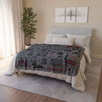 Salem landmark collage blanket spread across a bed in a neutral bedroom