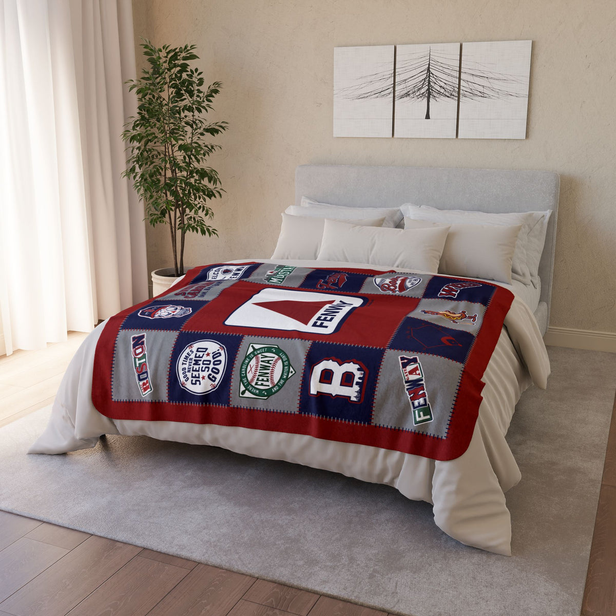 Red, navy and gray Boston baseball fleece blanket displayed across a bed