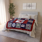 Red, navy and gray Boston baseball fleece blanket displayed across a bed