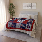 Red, navy and gray New England football fleece blanket displayed across a bed