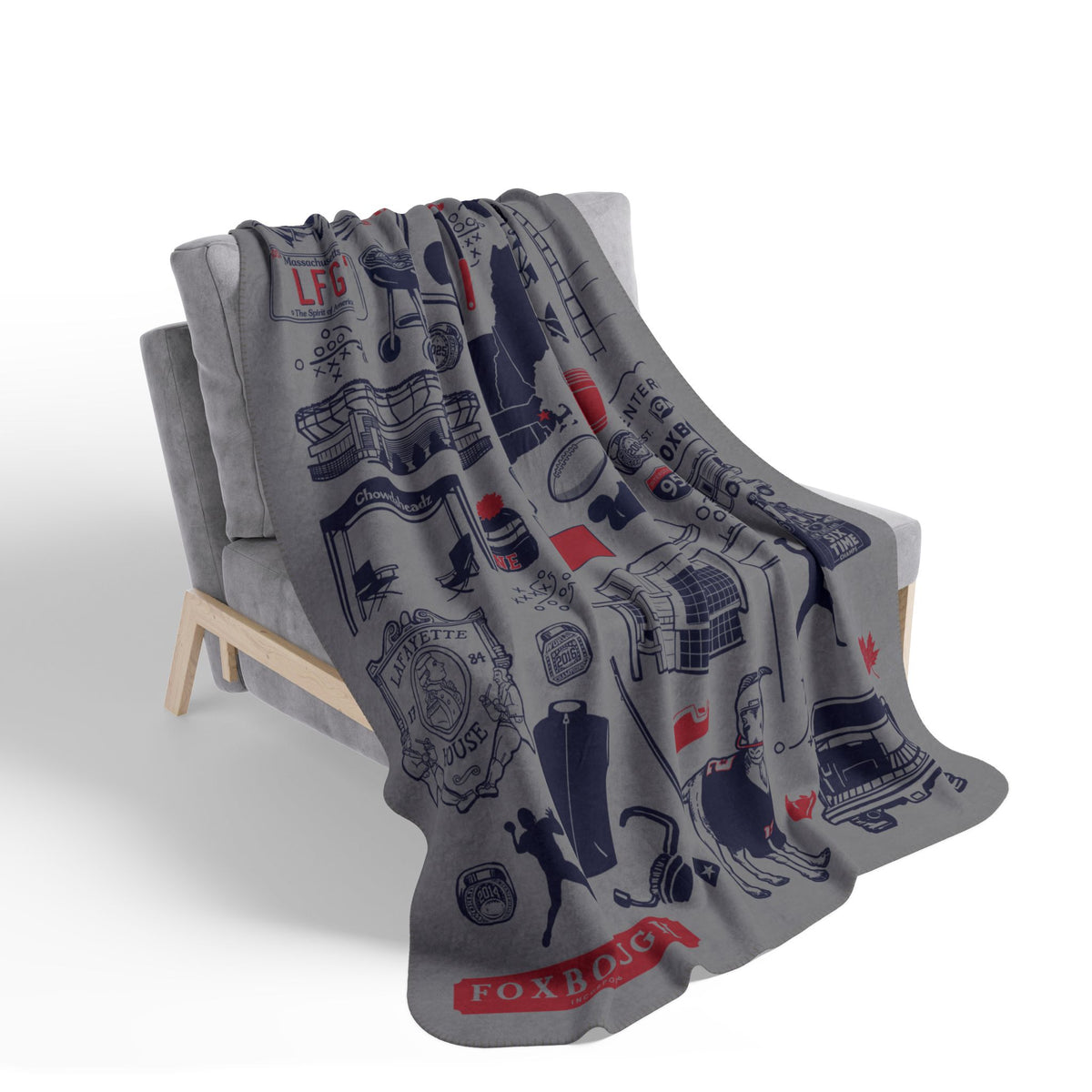 Gray Foxboro football tourist-attraction fleece blanket draped over a chair