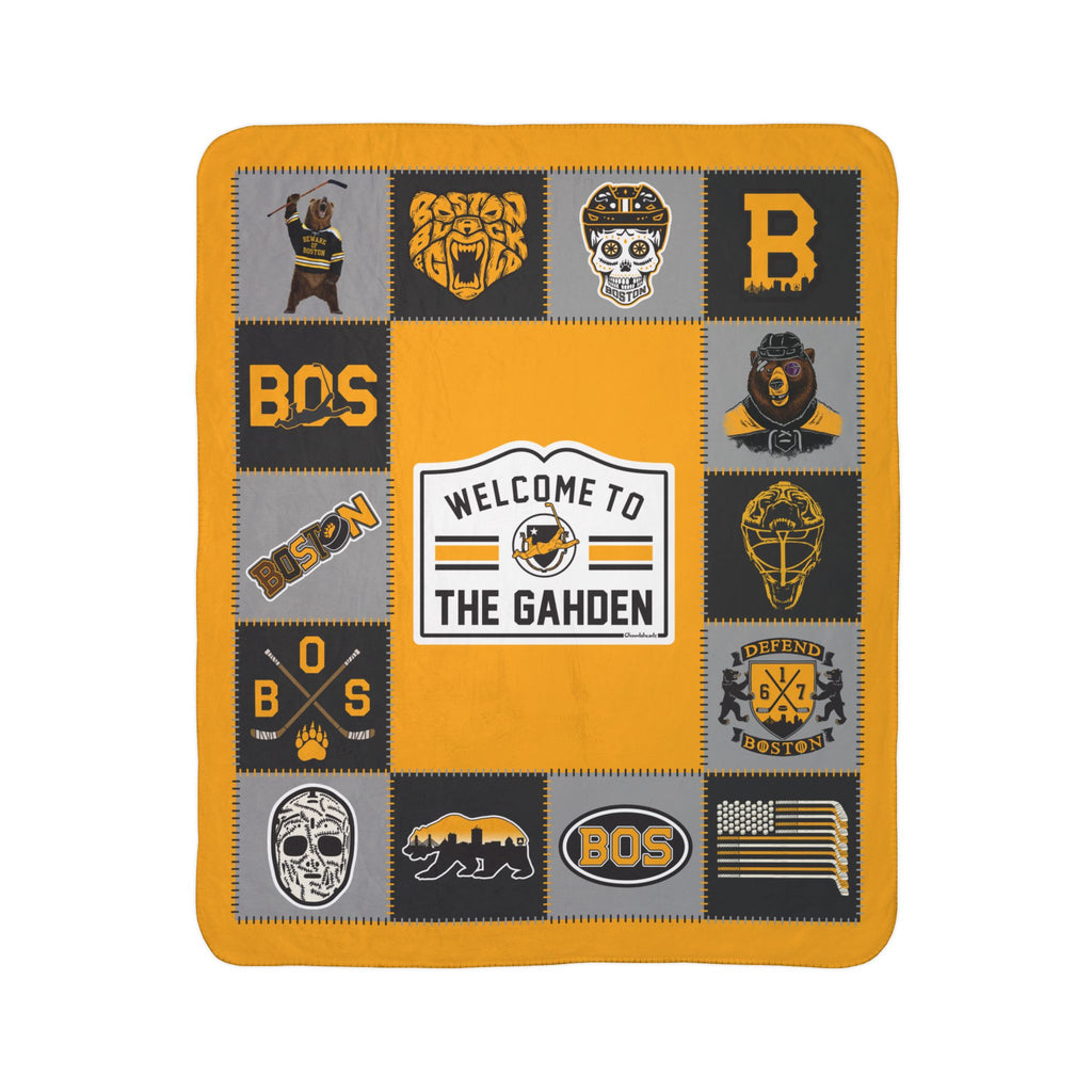 Boston hockey fleece sherpa blanket laid flat with gold, black and gray bear graphics and a Welcome to the Gahden sign