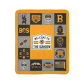 Boston hockey fleece sherpa blanket laid flat with gold, black and gray bear graphics and a Welcome to the Gahden sign
