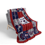 New England football Foxboro patchwork-style fleece blanket draped over a gray chair