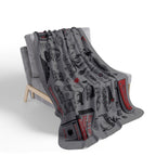 Gray Salem tourist-attraction blanket with black and red illustrations draped over a chair