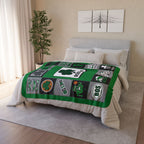 Green, black and gray Boston basketball fleece blanket displayed across a bed