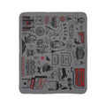 Salem fleece sherpa blanket laid flat with black landmark and witch illustrations and red accents on gray