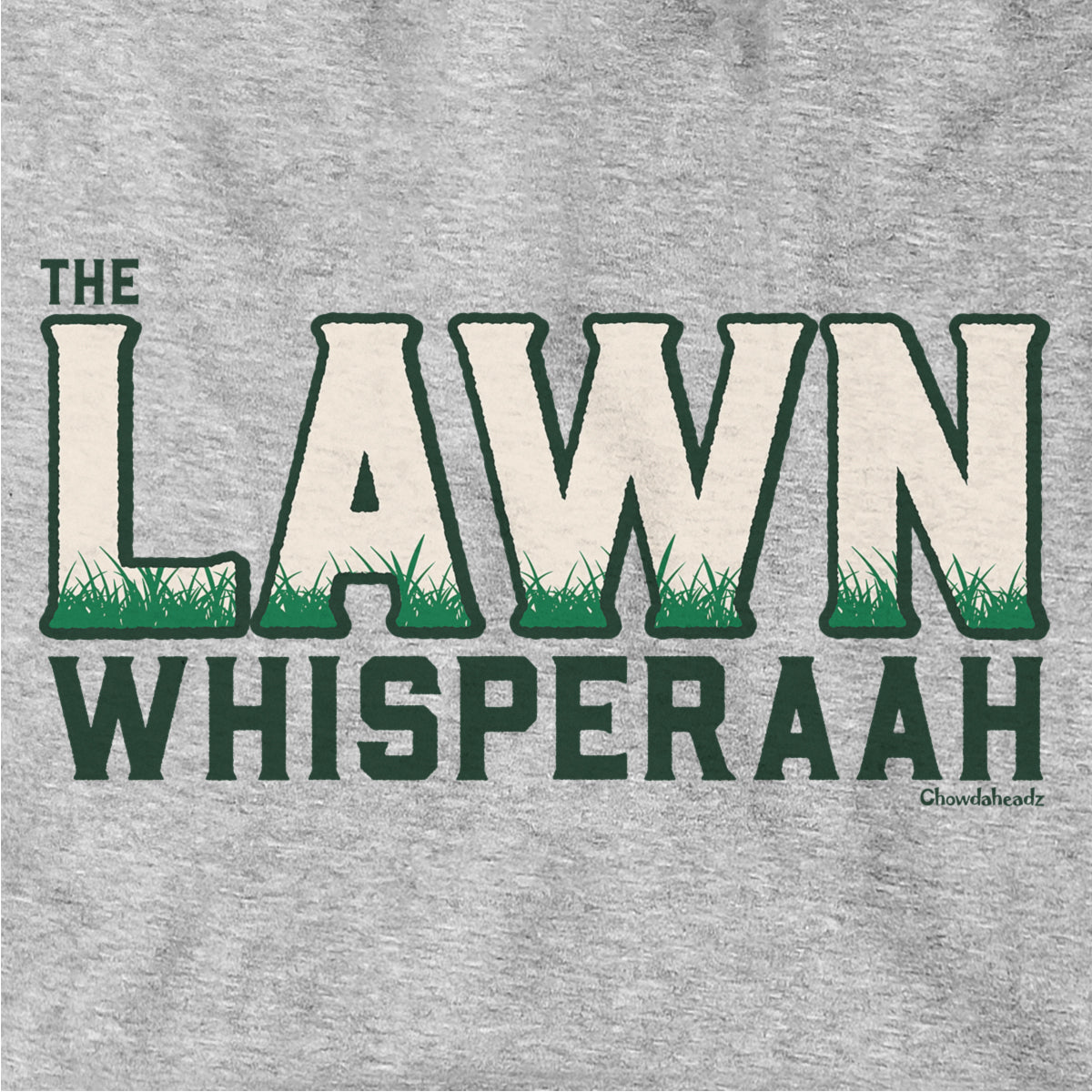 Close-up of Lawn Whisperaah lettering with green grass details on gray hoodie fabric