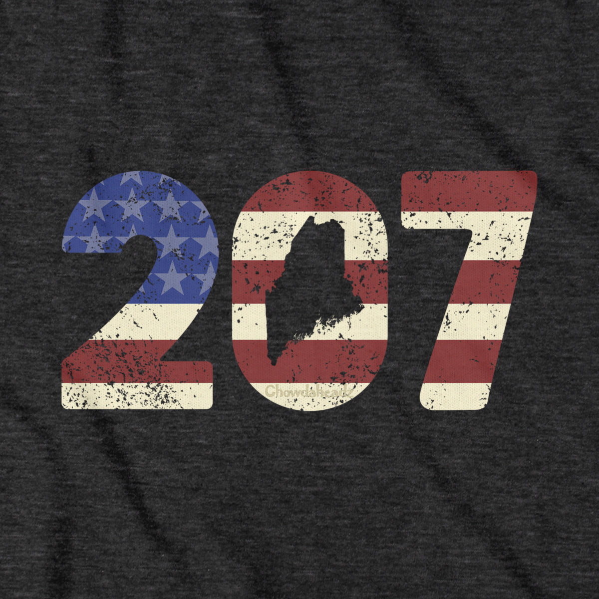 Close-up of charcoal Patriotic 207 t-shirt design — area code and flag detail