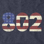 Close-up of heather blue Patriotic 802 hoodie design — area code and flag detail