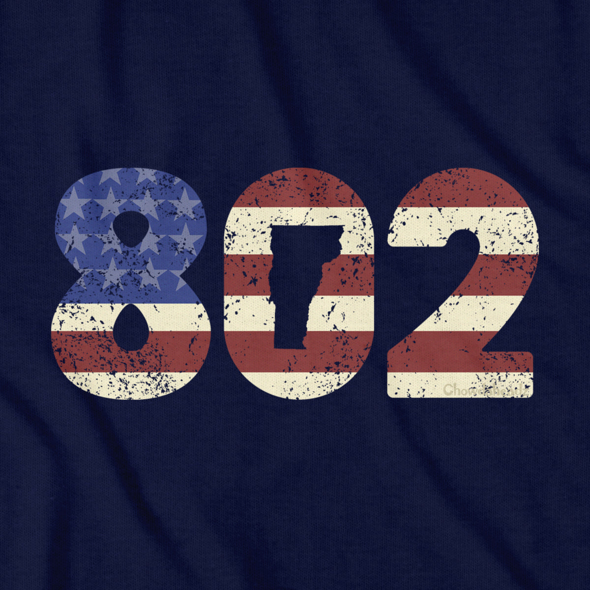 Close-up of navy Patriotic 802 t-shirt design — area code and flag detail