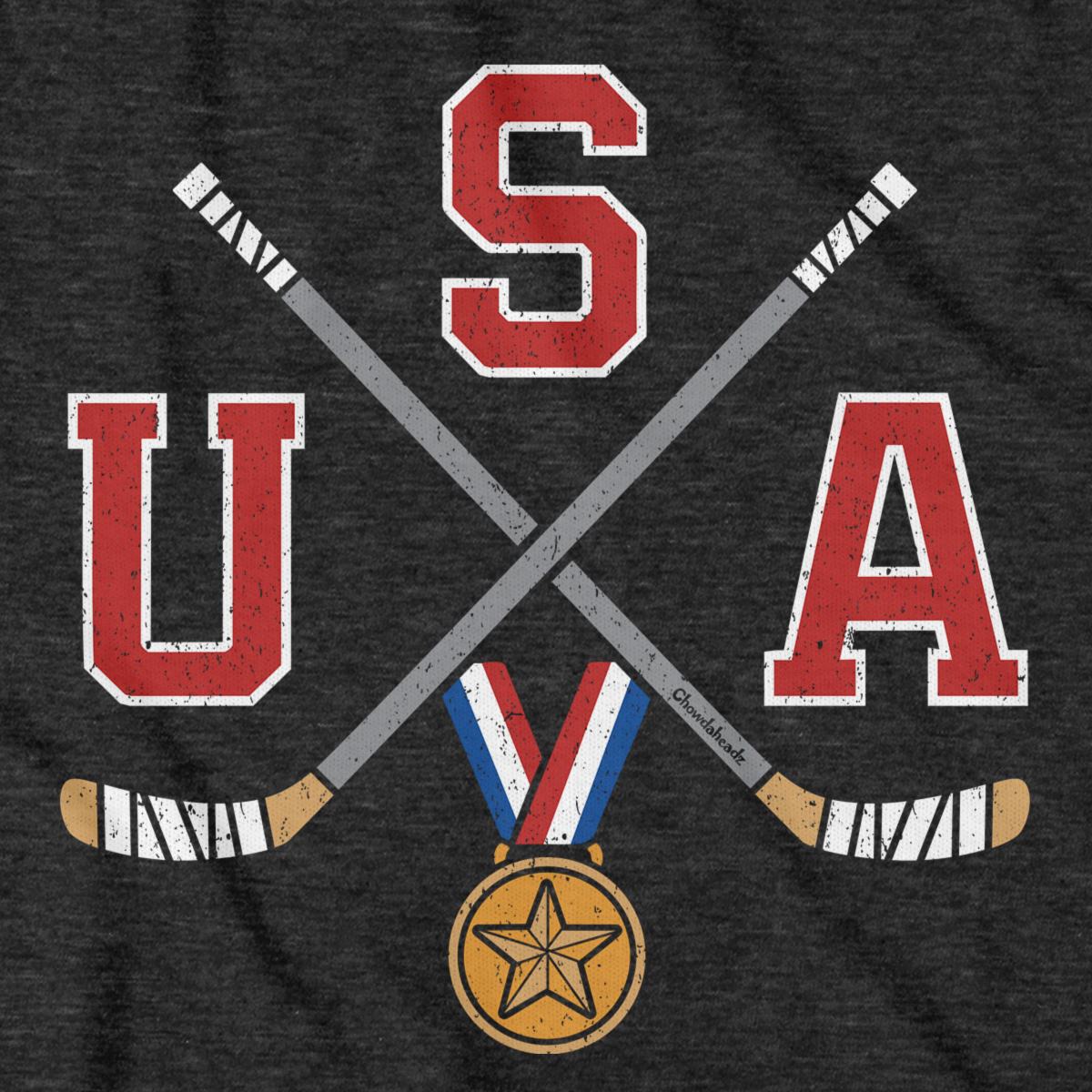 Close-up of charcoal USA Cross Sticks shirt design — crossed sticks and flag detail