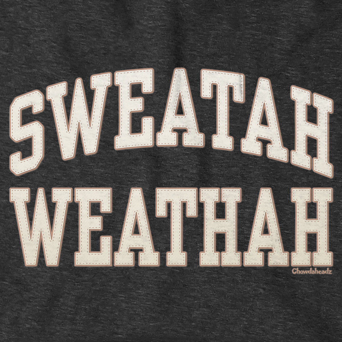 Close-up of cream-and-tan Sweatah Weathah lettering with stitch-style detailing on charcoal fabric