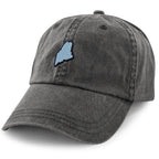 Angled front view of a washed charcoal dad hat with a curved brim and small light-blue Maine-shaped patch