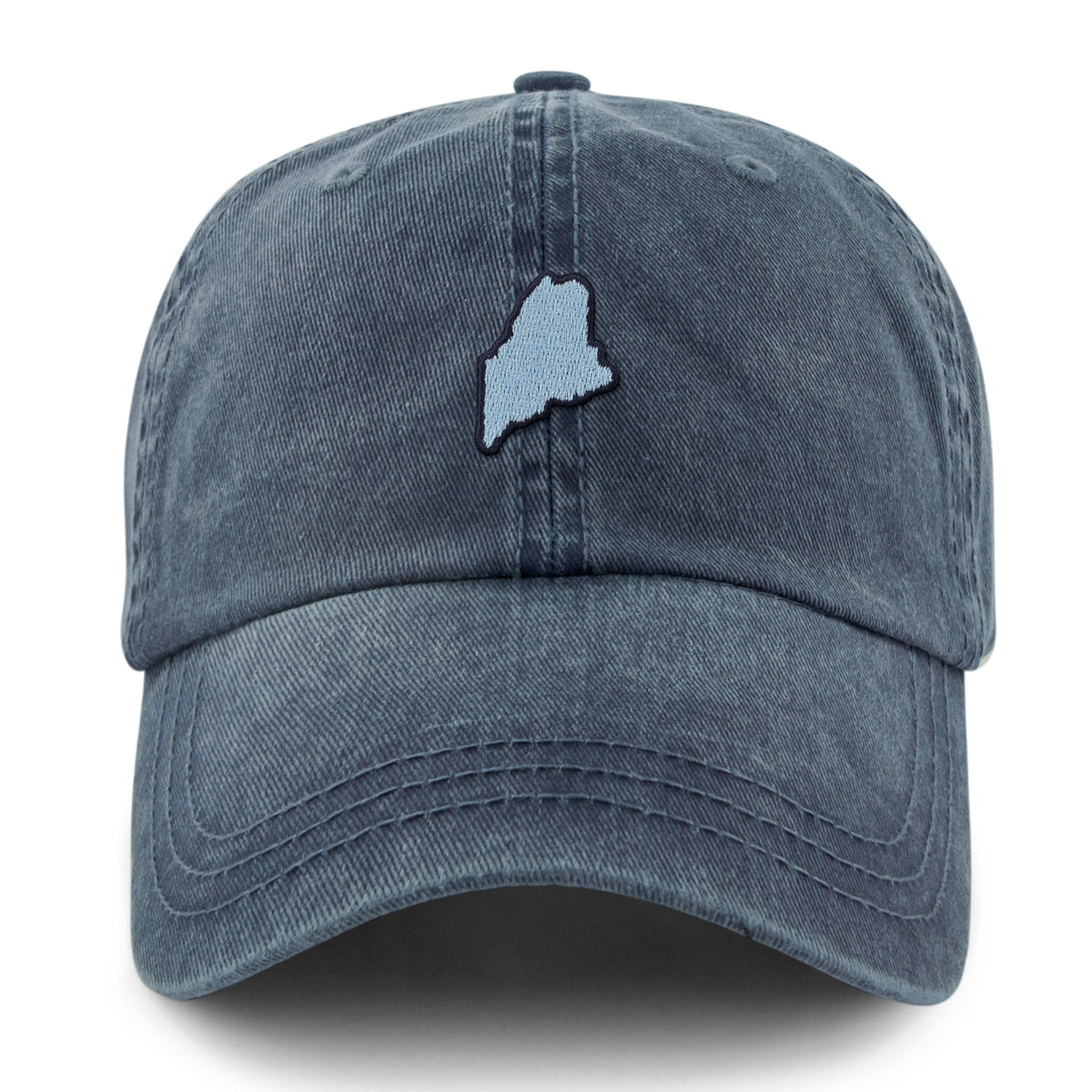 Straight-on front view of a washed navy dad hat with a light-blue Maine-shaped patch outlined in dark thread
