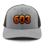 Front view of a gray Retro 603 New Hampshire snapback trucker hat with orange-and-red-striped numbers and a state silhouette in the zero