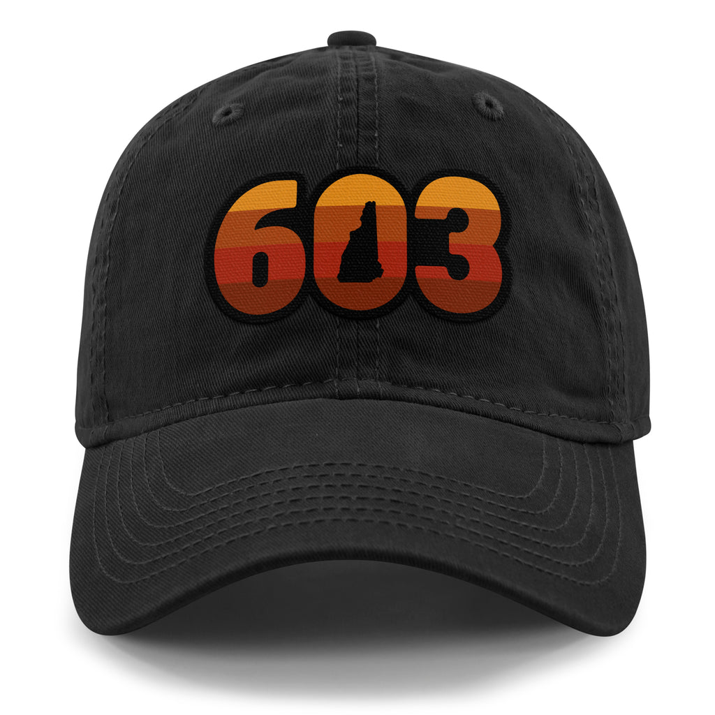Front view of a black Retro 603 New Hampshire dad hat with orange-and-red-striped numbers and a state silhouette in the zero