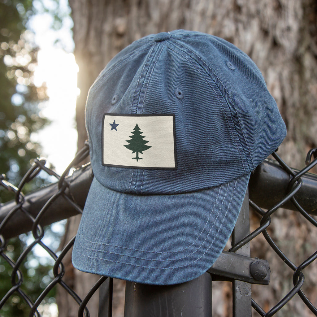 Vintage Maine Flag Washed Dad Hat — lifestyle view in Navy