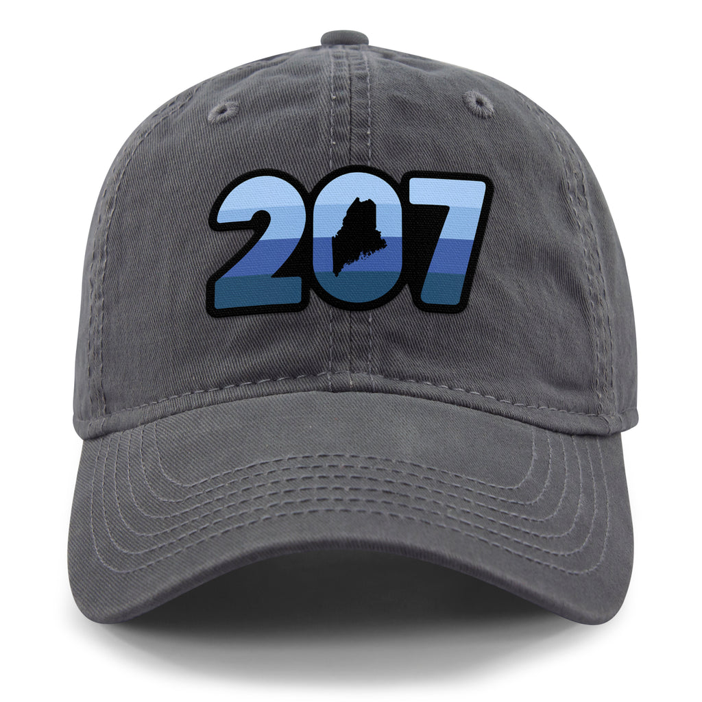 Front view of a charcoal Retro 207 Maine dad hat with blue-striped numbers and a state silhouette in the zero