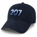Three-quarter front view of a navy Retro 207 Maine dad hat with blue-striped numbers and a state silhouette in the zero