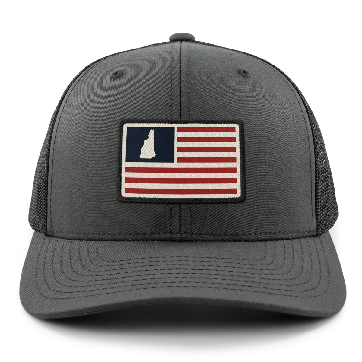 Front of charcoal NH USA Flag Patch snapback trucker — flag patch detail