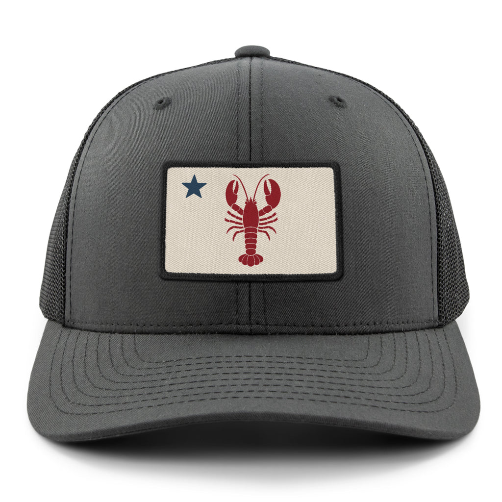 Front of charcoal Maine Lobster Flag snapback trucker with lobster-and-star Maine flag patch