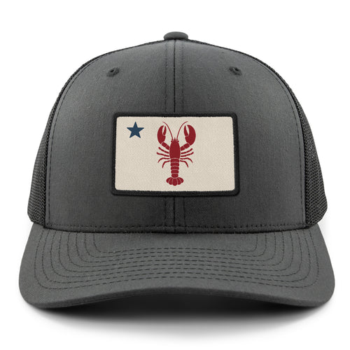 Front of charcoal Maine Lobster Flag snapback trucker with lobster-and-star Maine flag patch