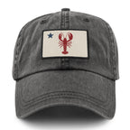 Front of charcoal Maine Lobster Flag washed dad hat with lobster-and-star Maine flag patch