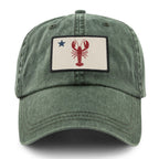 Front of dark green Maine Lobster Flag washed dad hat with lobster-and-star Maine flag patch