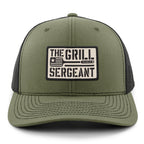 Charcoal snapback trucker hat with The Grill Sergeant leather patch on front