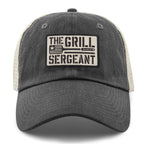 Navy relaxed trucker hat with The Grill Sergeant leather patch on front