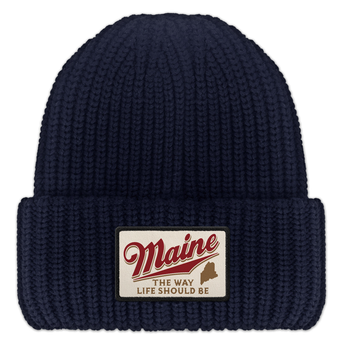 Front of navy chunky knit hat with folded cuff and Maine The Way Life Should Be patch