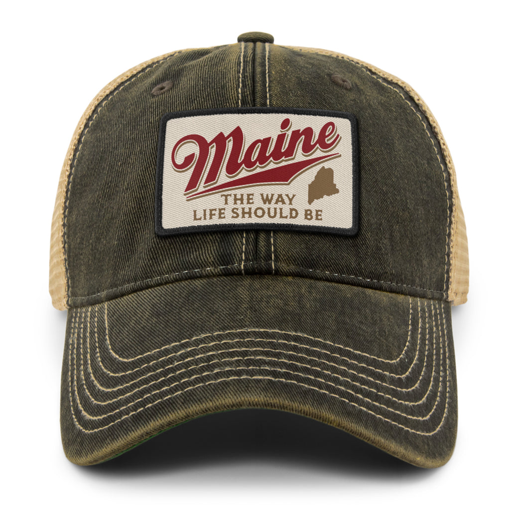 Front view of the Black Maine trucker hat with red Maine script, a state silhouette, and contrast brim stitching