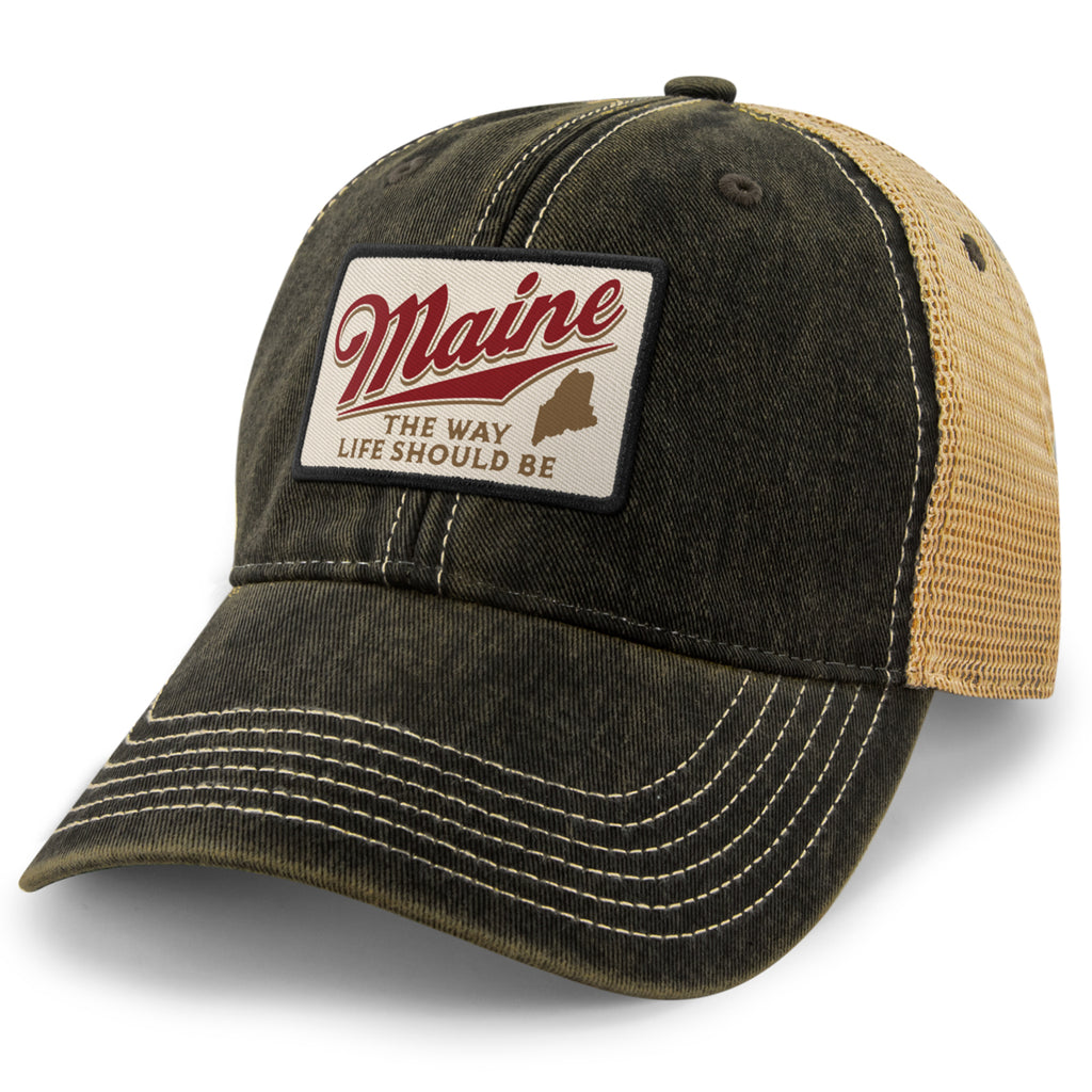 Black Dirty Water Trucker Hat with tan mesh and a cream Maine The Way Life Should Be patch, angled front view
