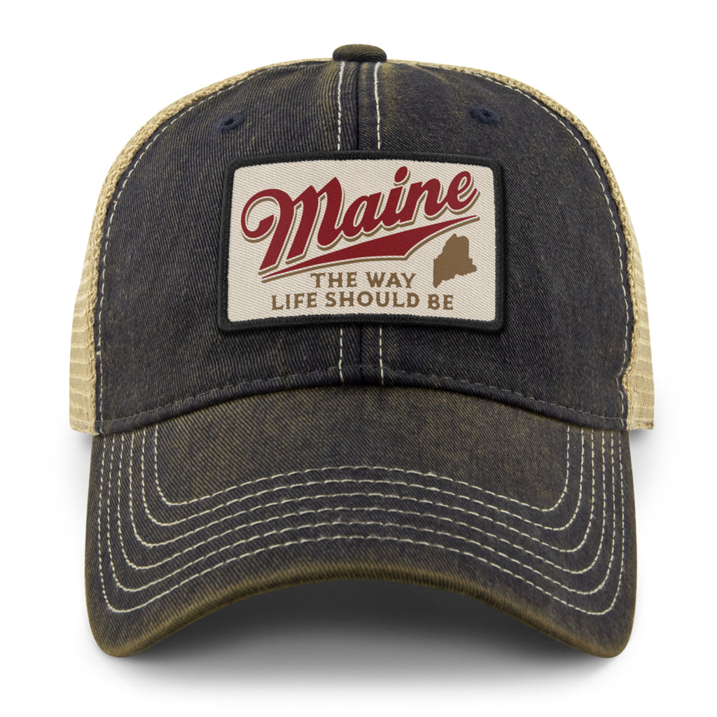 Front view of the Navy Maine trucker hat with red Maine script, a state silhouette, and contrast brim stitching