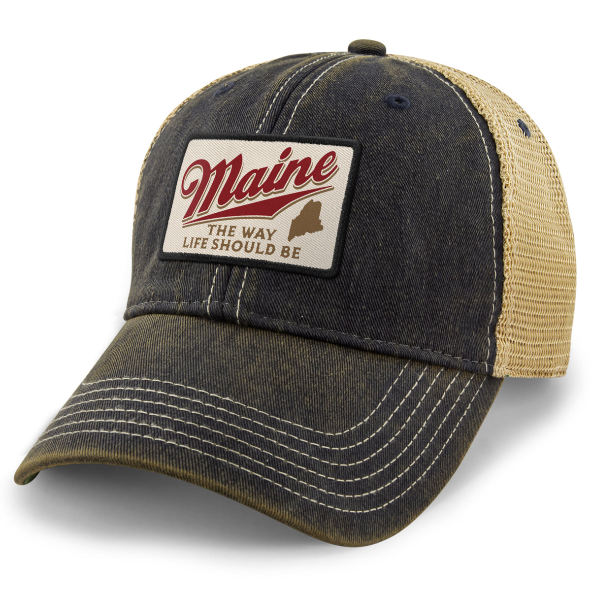 Navy Dirty Water Trucker Hat with tan mesh and a cream Maine The Way Life Should Be patch, angled front view
