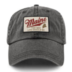 Front of charcoal washed dad hat with Maine The Way Life Should Be patch