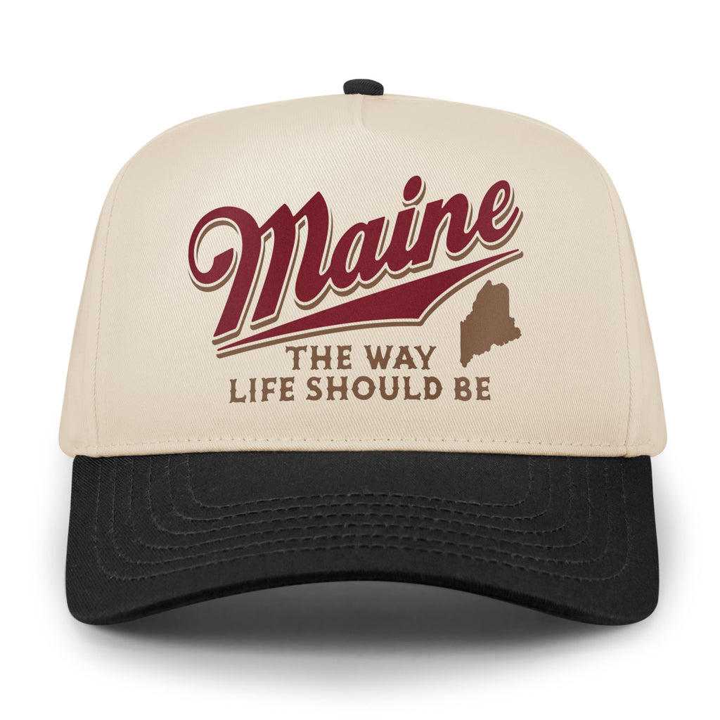 Front of stone retro snapback with black brim, red Maine script and brown state silhouette
