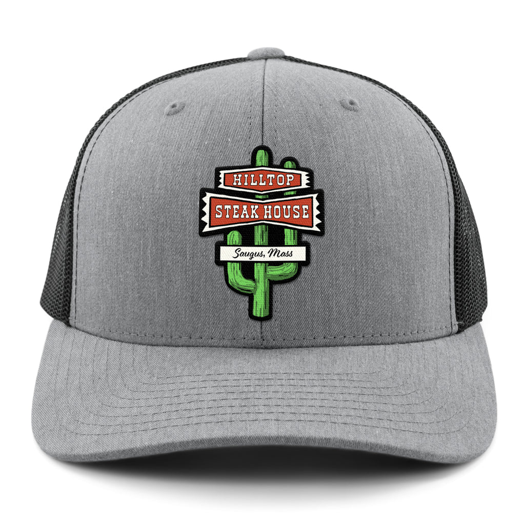 Front view of gray Hilltop Steakhouse snapback trucker hat with green cactus sign and Saugus, Mass lettering