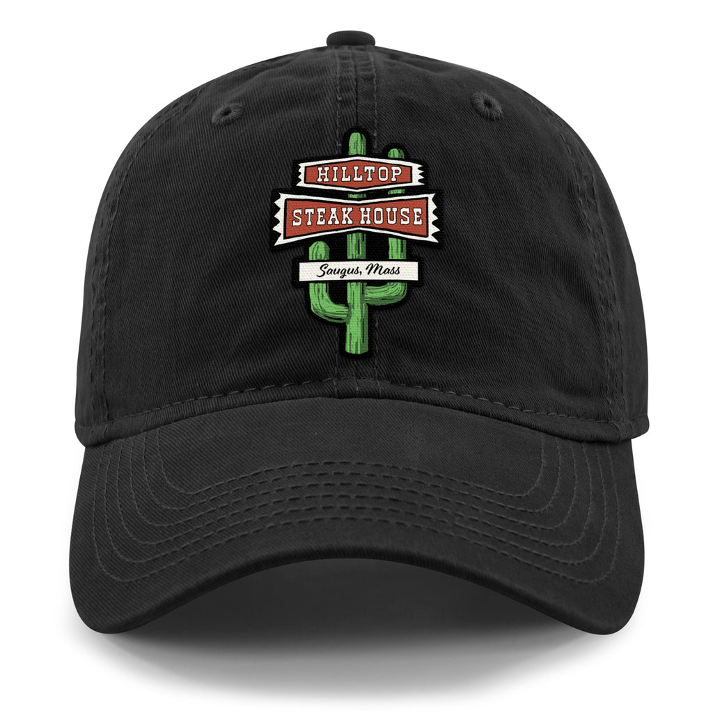 Front view of black Hilltop Steakhouse dad hat with green cactus sign and Saugus, Mass lettering
