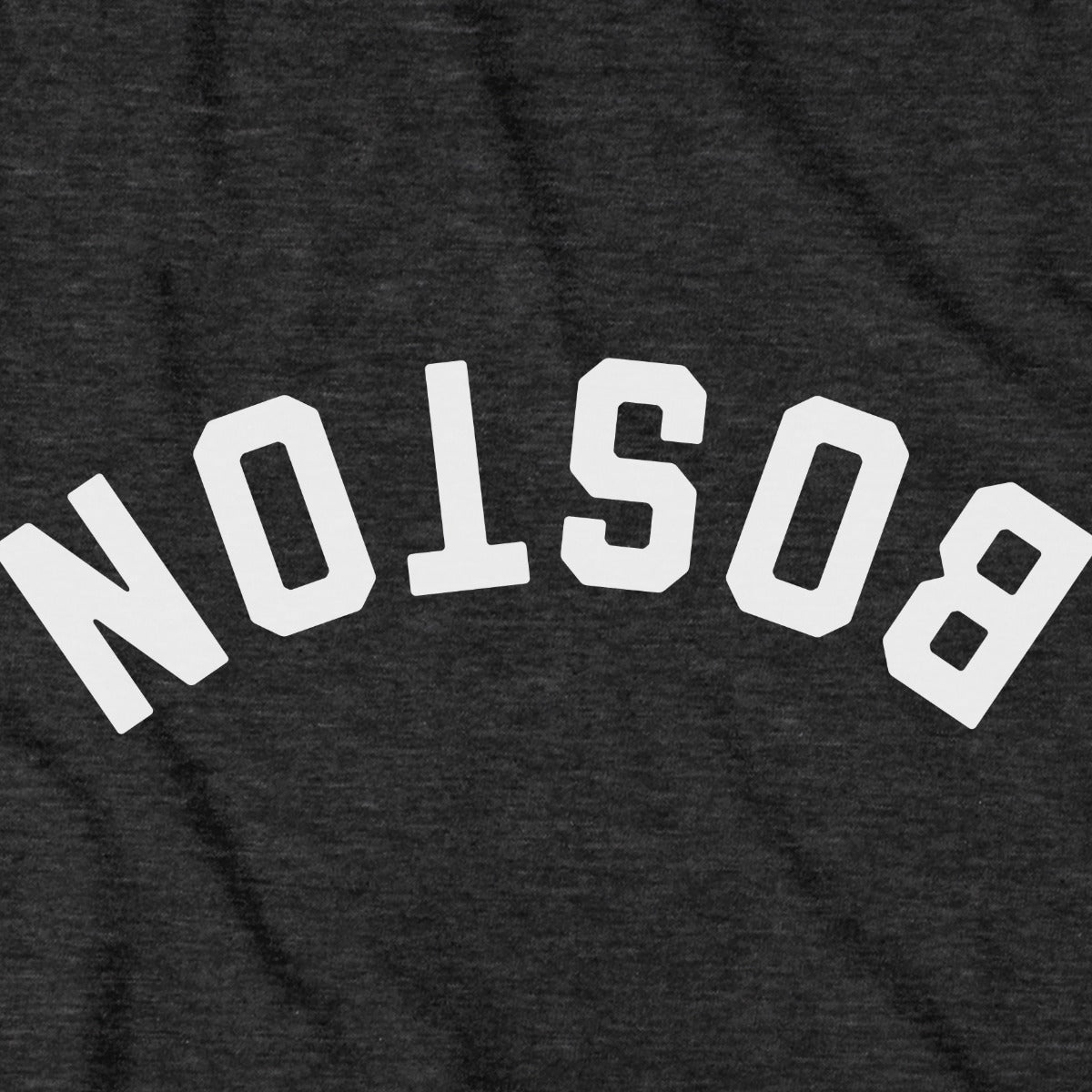 Close-up of Upside Down Arch t-shirt design in charcoal — inverted Boston arch detail