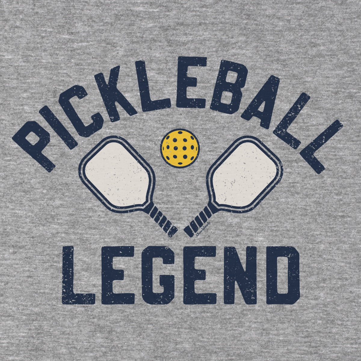 Close-up of gray Pickleball Legend hoodie graphic — bold pickleball-themed chest print
