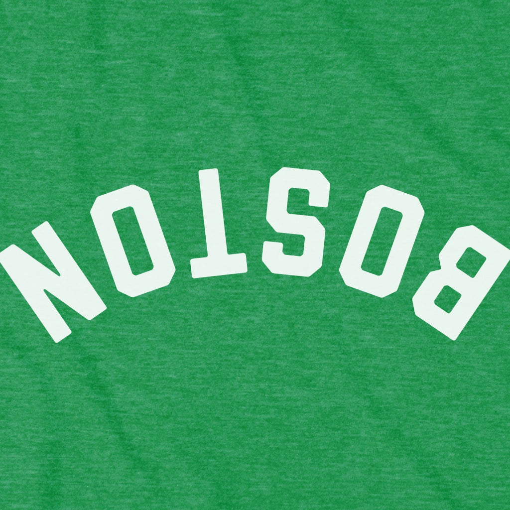 Close-up of Upside Down Arch t-shirt design in kelly green — inverted Boston arch detail