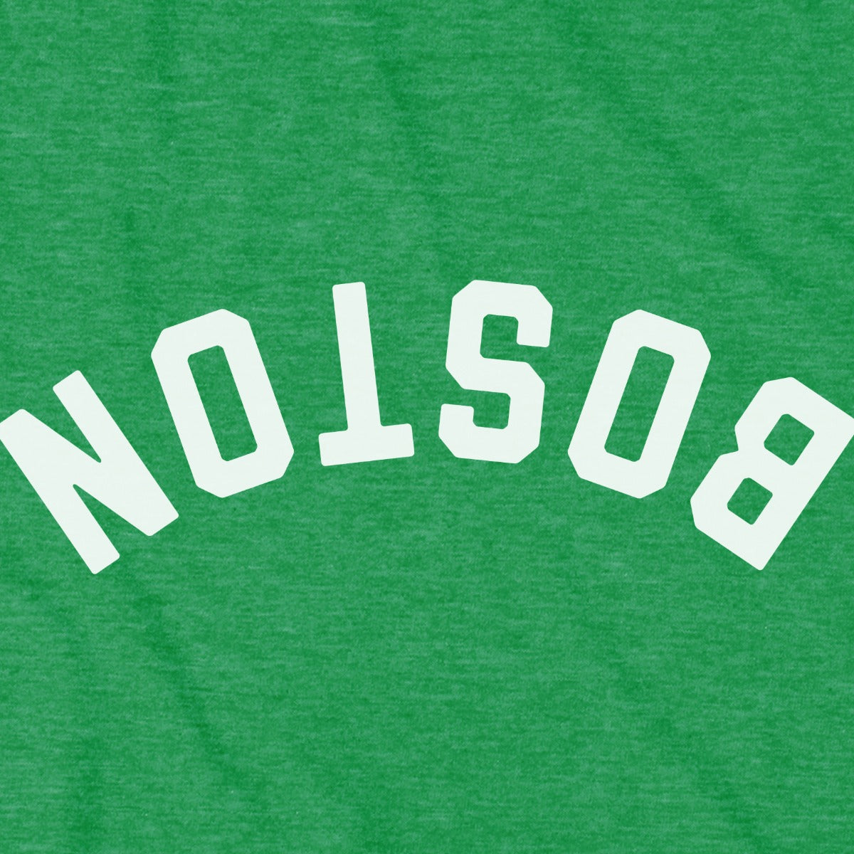 Close-up of Upside Down Arch t-shirt design in kelly green — inverted Boston arch detail